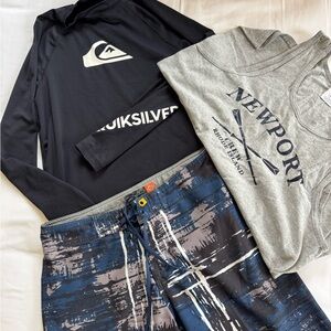 Quiksilver Black Rash Guard with Grey Waistband and Blue Patterned Boardshorts